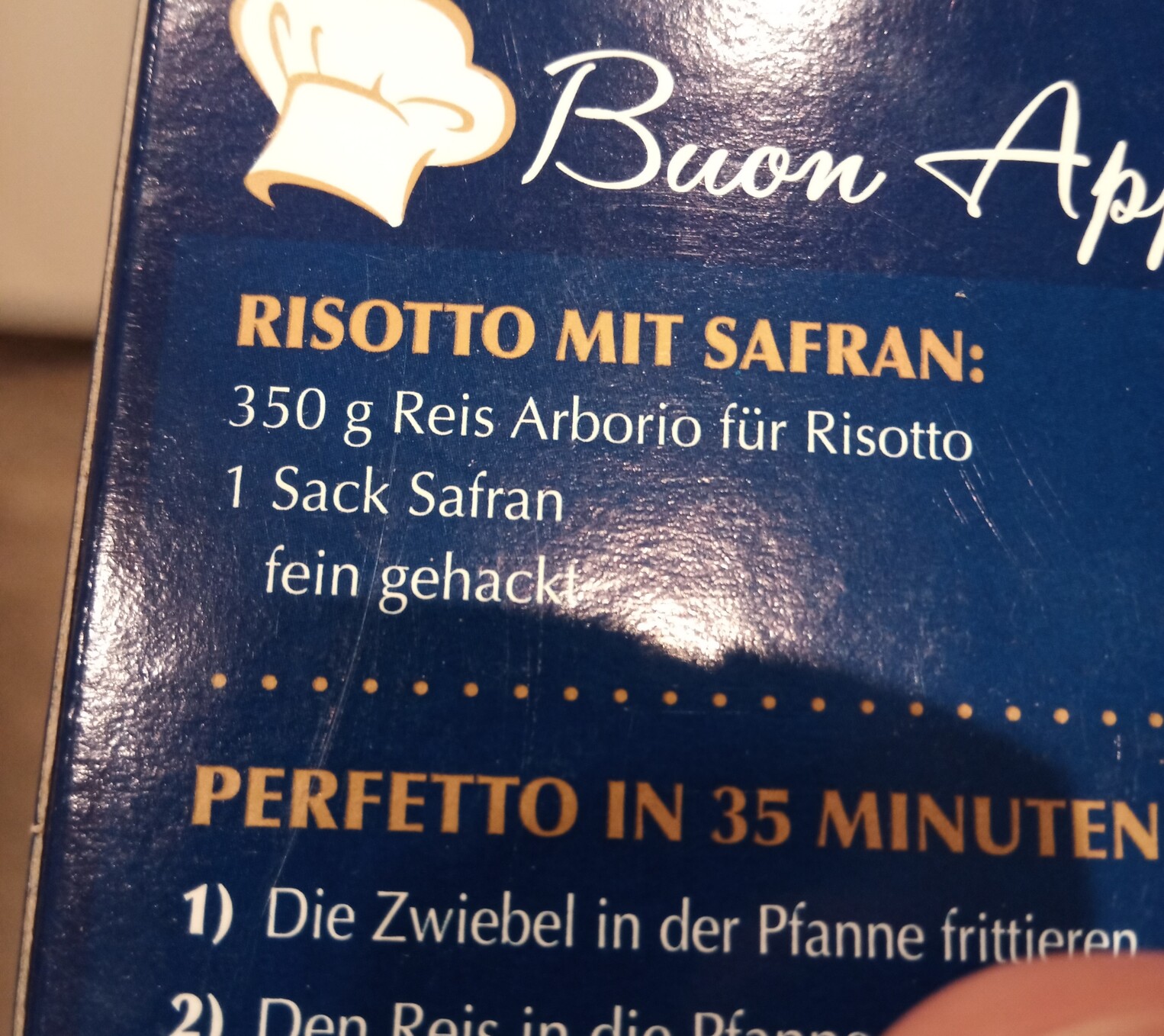Foto einer Risotto Reis Packung mit Rezept. Eine Zutat lautet: 